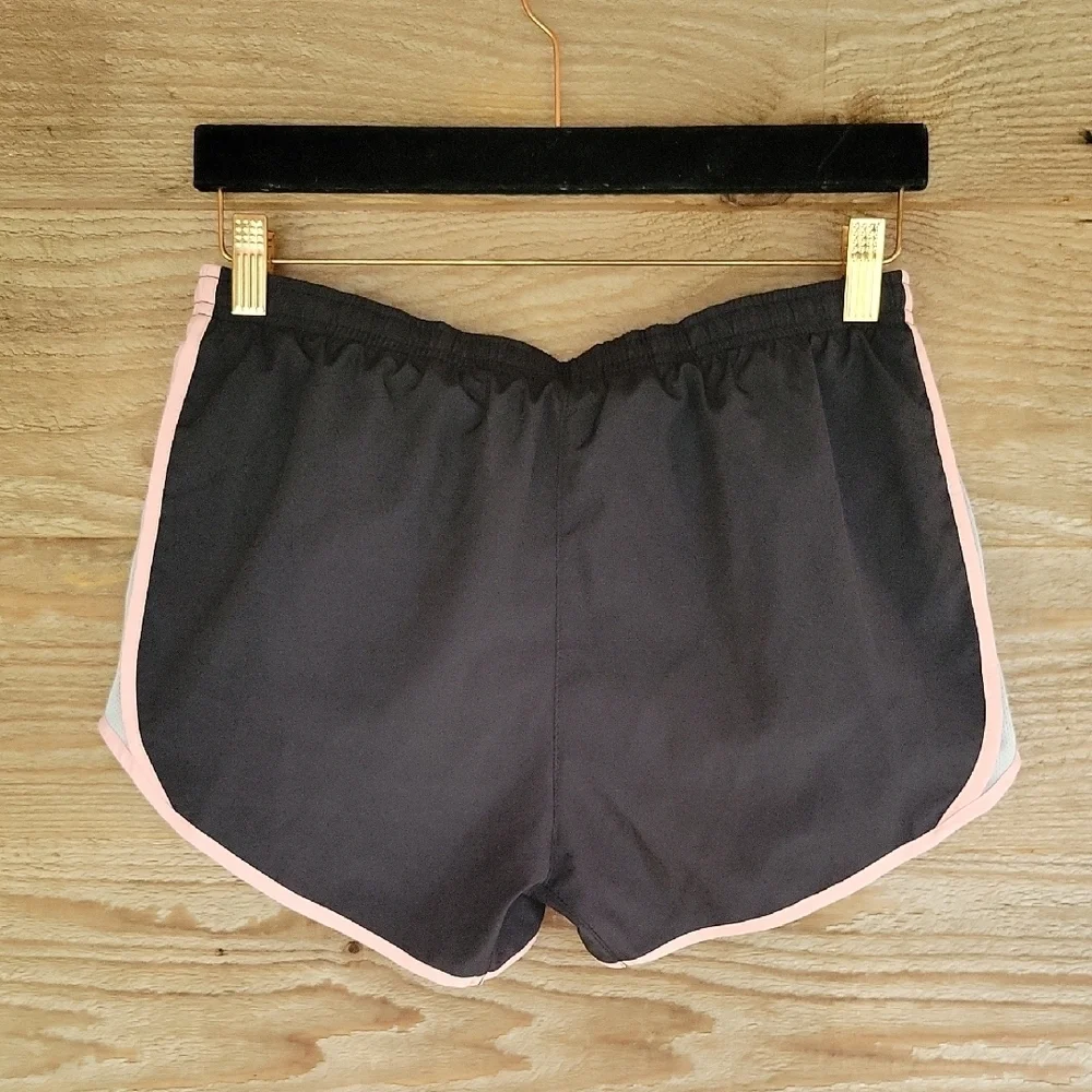 Nike Black and Pink Athletic Shorts with Curved Hem